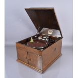 An HMV Model 109 Table Grand Gramophone, mahogany version, with HMV No.4 Soundbox, Nipper and