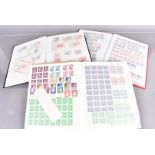 An assortment of German and Third Reich Postage stamps, in four well presented albums and loose,