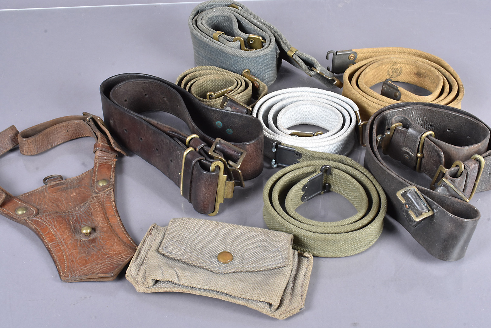 Two WWI Leather belts, together with a sword hanger, plus a selection of other War period rifle