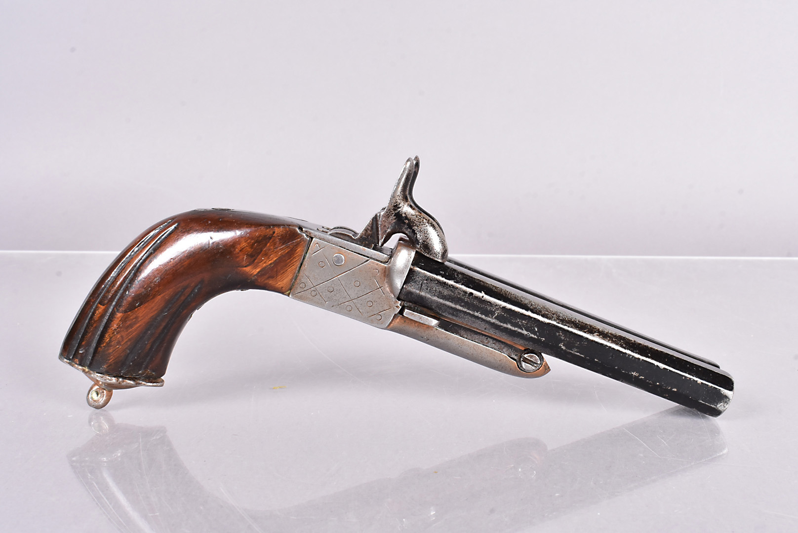 A 19th Century Continental Pin-Fire Double Barrelled pistol, with 10.8cm long octagonal barrels,