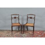 A pair of 19th century mahogany side chairs, spiral carved top rails and decorative carved splats,