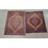 Two Persian senneh style wool rugs, the largest 107cm x 74cm & 95cm x 74cm (2)