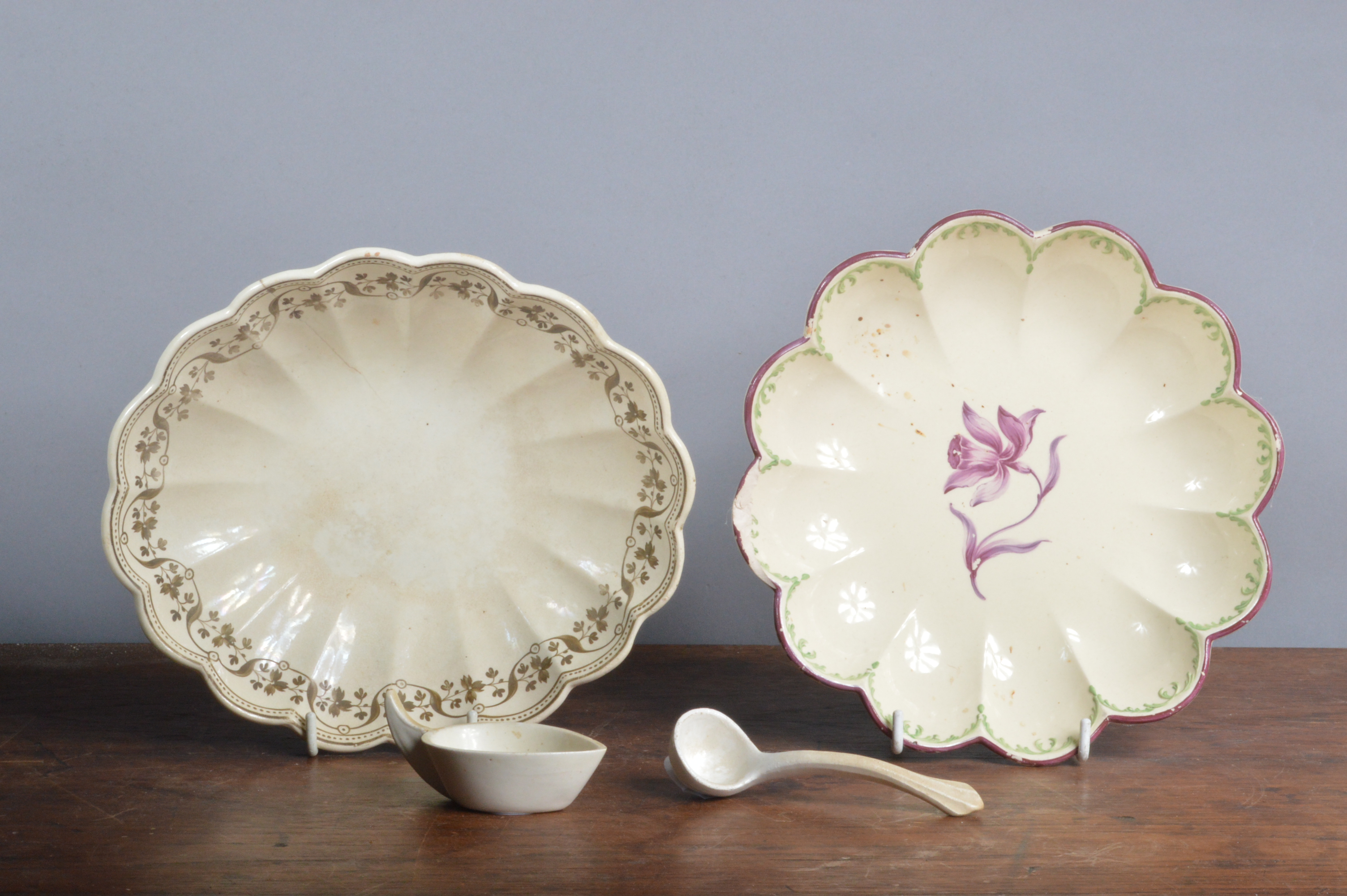 A group of mainly 18th century creamware, to include a Wedgwood hand-painted floral dish, a