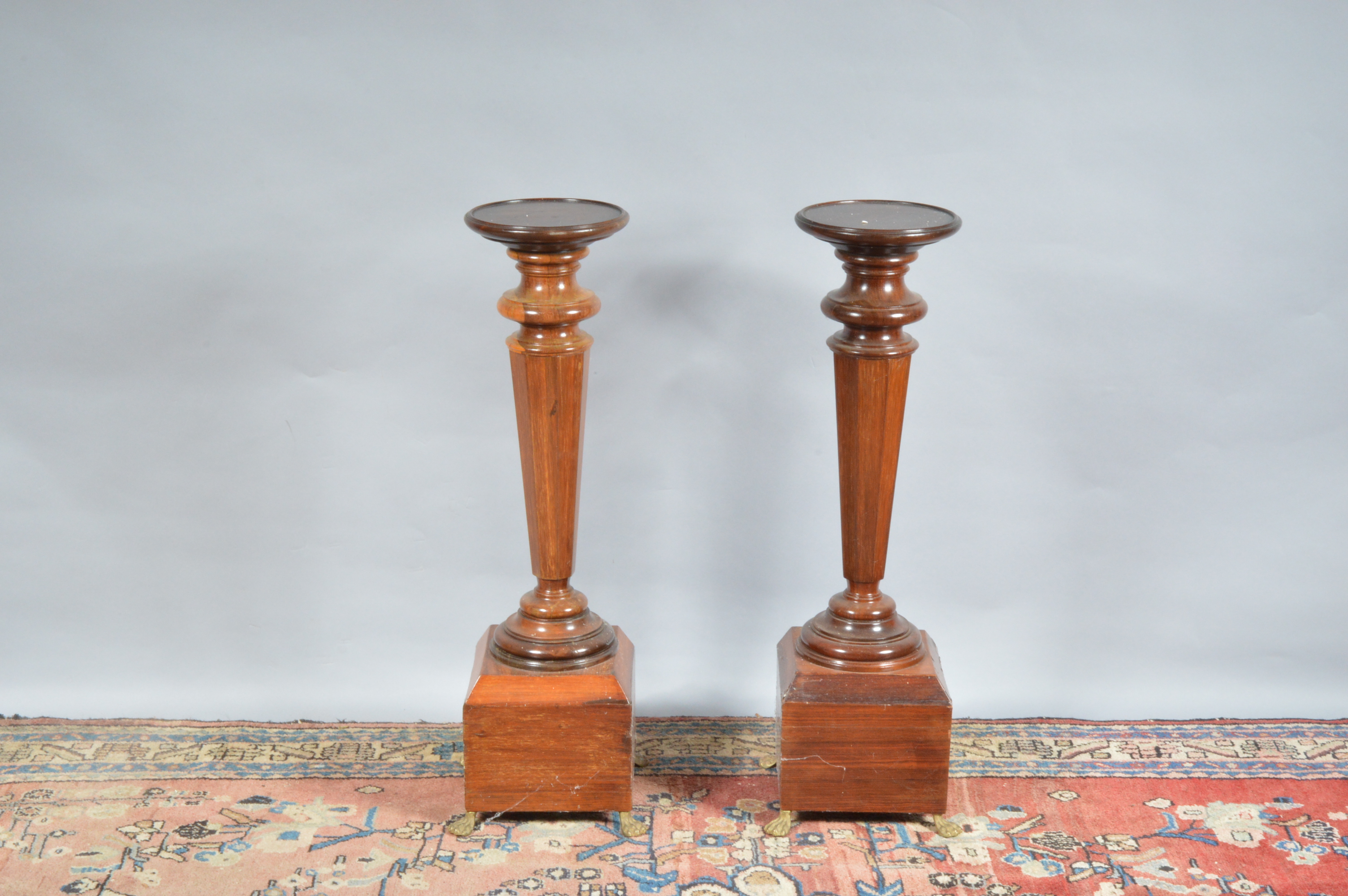 A Pair of regency style Rosewood jardinieres, circular tops, with turned columns, both raised on