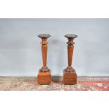 A Pair of regency style Rosewood jardinieres, circular tops, with turned columns, both raised on