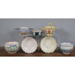A group of 19th century French faience wares, to include two sponge-decorated bowls, a flower