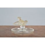 A 20th century Lalique France ashtray, marked to the underside modelled as a bird with