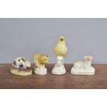 A group of mid-19th century Staffordshire animals, to include a rabbit, a lion, a canary and a