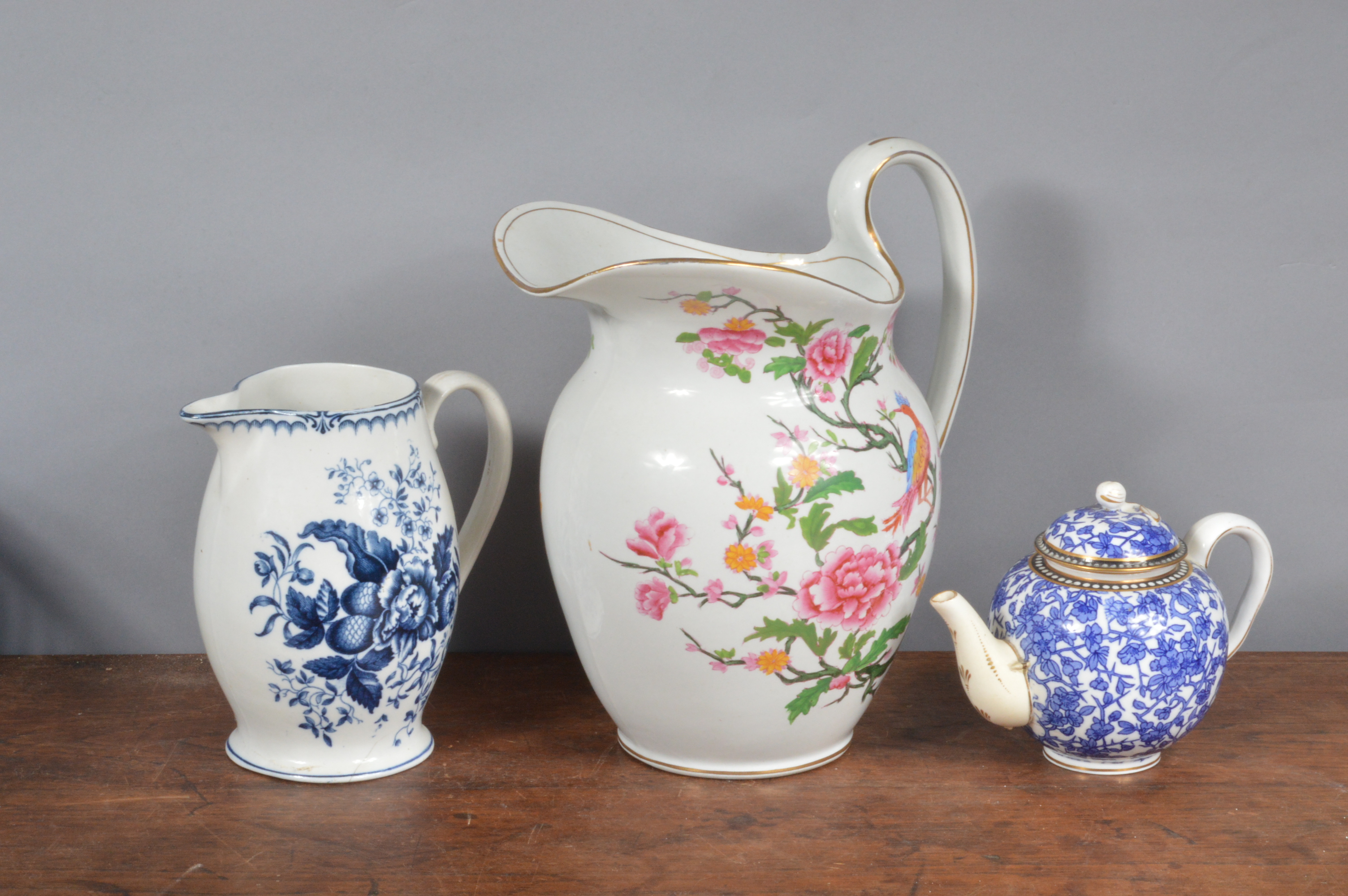 A late 19th century blue and white Coalport teapot, together with a large printed and painted with