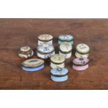 A collection of mainly 18th and 19th century Bilsten enamel patch boxes, all hand-painted with