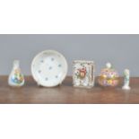 A group of Herend porcelain wares, to include a pierced lidded pot, a small vase, a decorative
