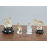 A Lalique France swan, 5.5cm x 5.5cm (excluding the stand), the neck cracked and repaired, together