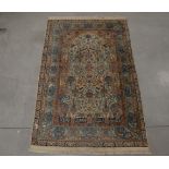 A Persian signed silk on cotton prayer or tea rug, multi-coloured design featuring birds and