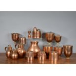 A collection of 19th century and later copper kitchen items, including graduated storage vessels,