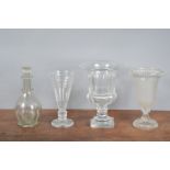 Three 19th century and later glass vases, one with an opaque centre 27cm high, two cut glass