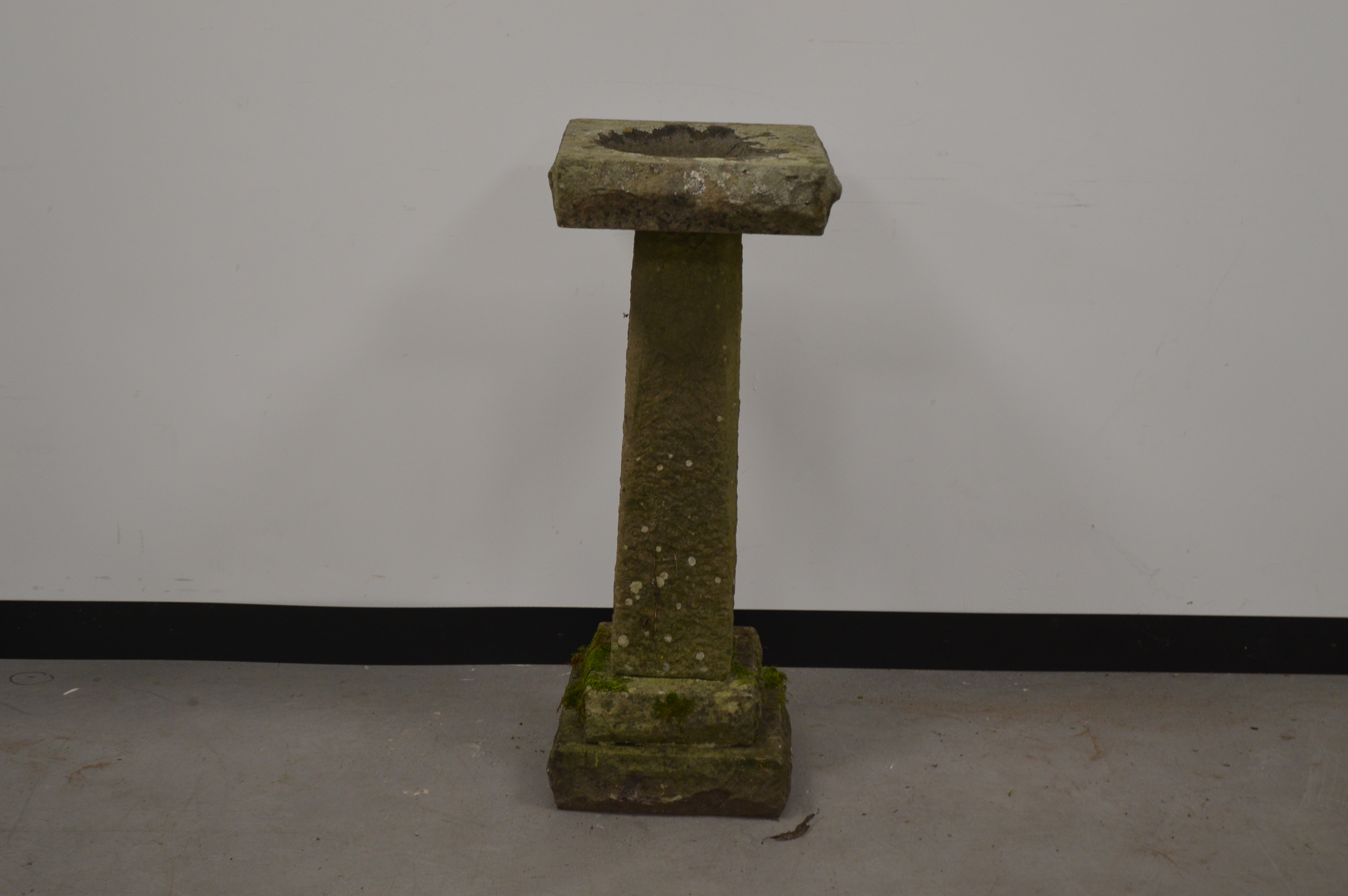 A stone bird bath in three sections, 90 cm tall. Some wear and weathering. AF (1)