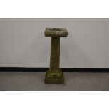 A stone bird bath in three sections, 90 cm tall. Some wear and weathering. AF (1)