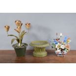 A 20th century toleware candelabra, in the form of flowers, 43cm high, a green toleware basket, and