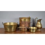 A collection of 19th century and later copper and brass items, comprising a brass trivet stand,