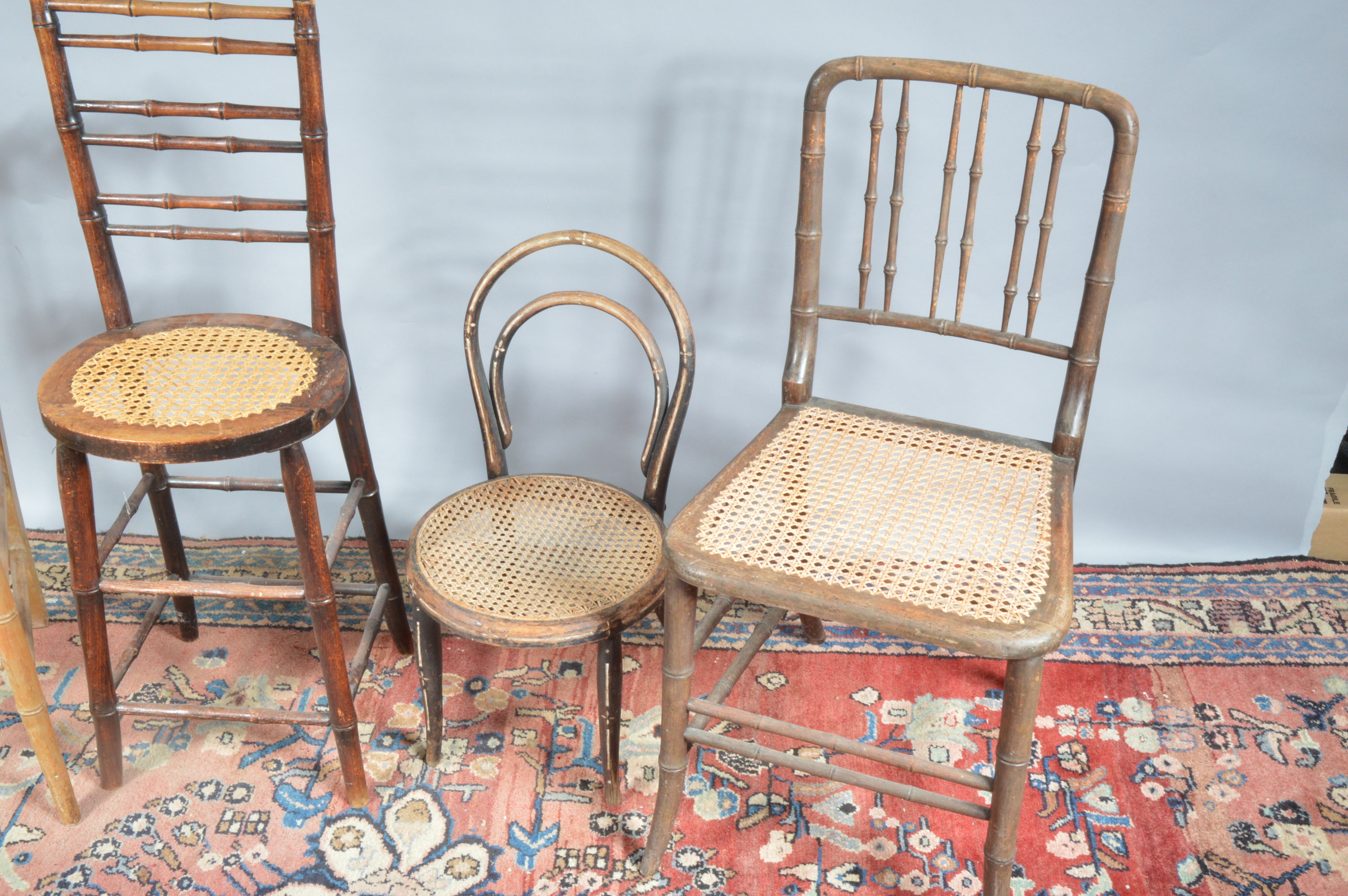 Four 19th century and later caned seats, differing styles and sizes, one a high seat with bamboo - Image 3 of 3