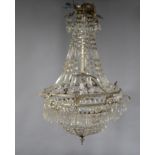 An early 20th century glass chandelier, with single light, electrified on a silvered frame