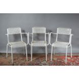 Three white-painted aluminium garden seats, pierced seats and backs, 76 cm tall, 48 cm wide. Some