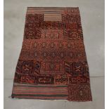 An unusual Middle Eastern rug, with kilim ends and soumac centre, 195cm x 107cm