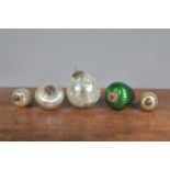 A group of late 19th/ early 20th century baubles, each of moulded form with mercury glass interior