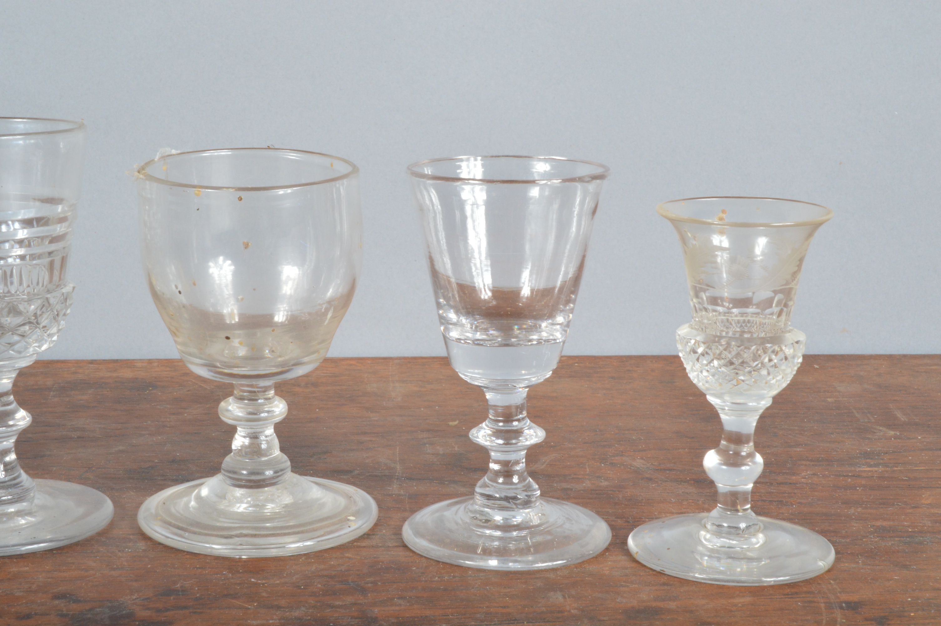 A collection of 19th century and later sherry or port glasses, including one with thistle cut - Image 2 of 3