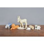 A collection of ceramic animals, comprising a horse (legs broken and repaired) in a crackled