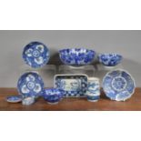 A group of late meiji Japanese blue and white wares, to include seven bowls, a dish, vase, saucer.