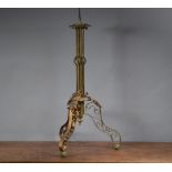 A 19th century Continental gilt metal and hand-painted candle stand, with plaster column mounted