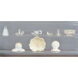 A mixed group of British and Continental white porcelain miniatures, to include two tapersticks, two