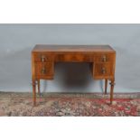 An Edwardian dressing table, missing the mirror top, one large central drawer without a handle, each