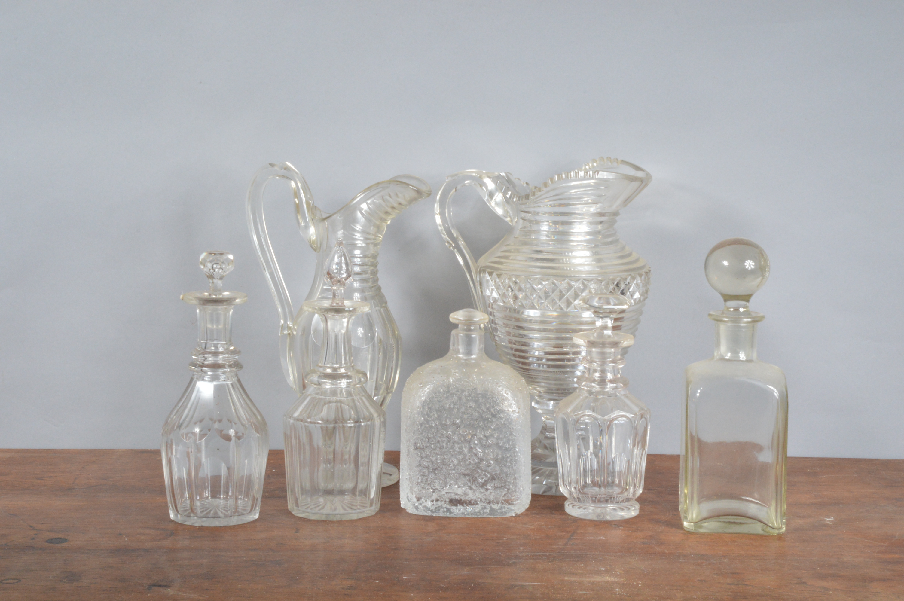 A collection of 19th century and later decanters, five in total of differing sizes and styles,