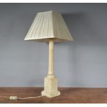 A large 19th century alabaster table lamp, with rectangular shade, fluted column on square base,
