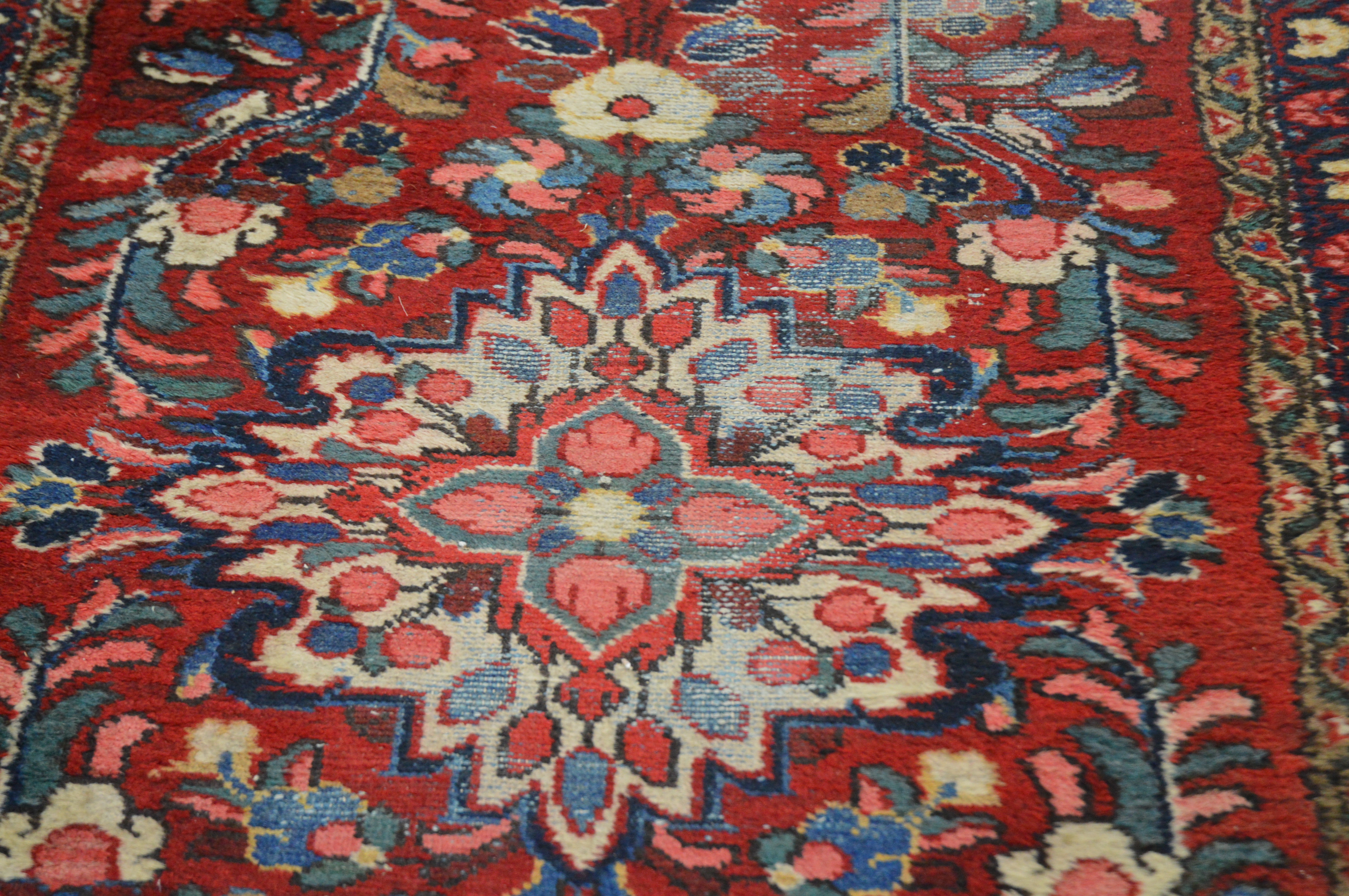 A modern Iranian wool runner, floral geometric pattern, with some wear 200cm x 87cm - Image 3 of 3