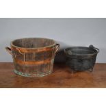 A copper bound wooden twin handled bucket, with wear, discolouration and damage, 26cm H x 48cm W,