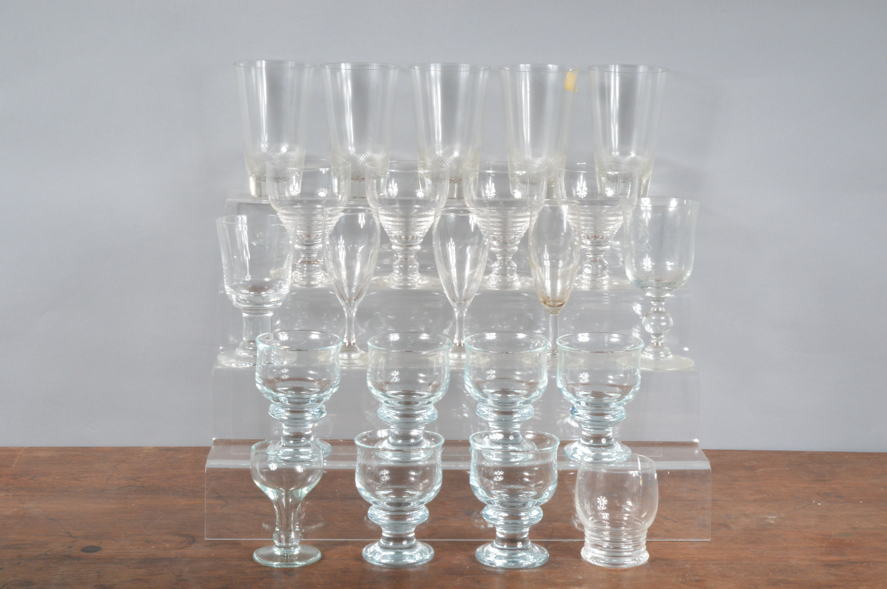 A collection of 20th century drinking glasses, including cut glass tumblers, wine glasses, etc,