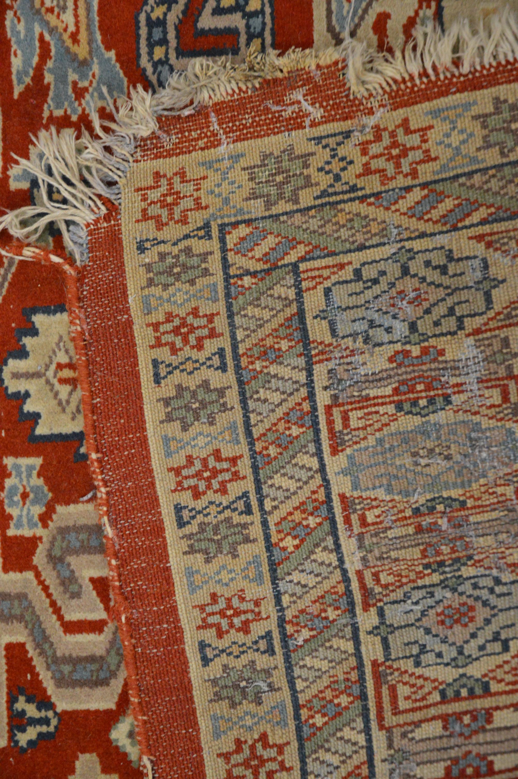 A Caucasian style wool on cotton rug, geometric design, faded and one corner with moth damage AF - Image 3 of 3