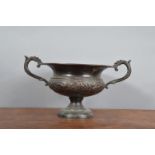 A 19th century twin handled vessel, in neoclassical style with foliate scroll design, 29cm x 16cm