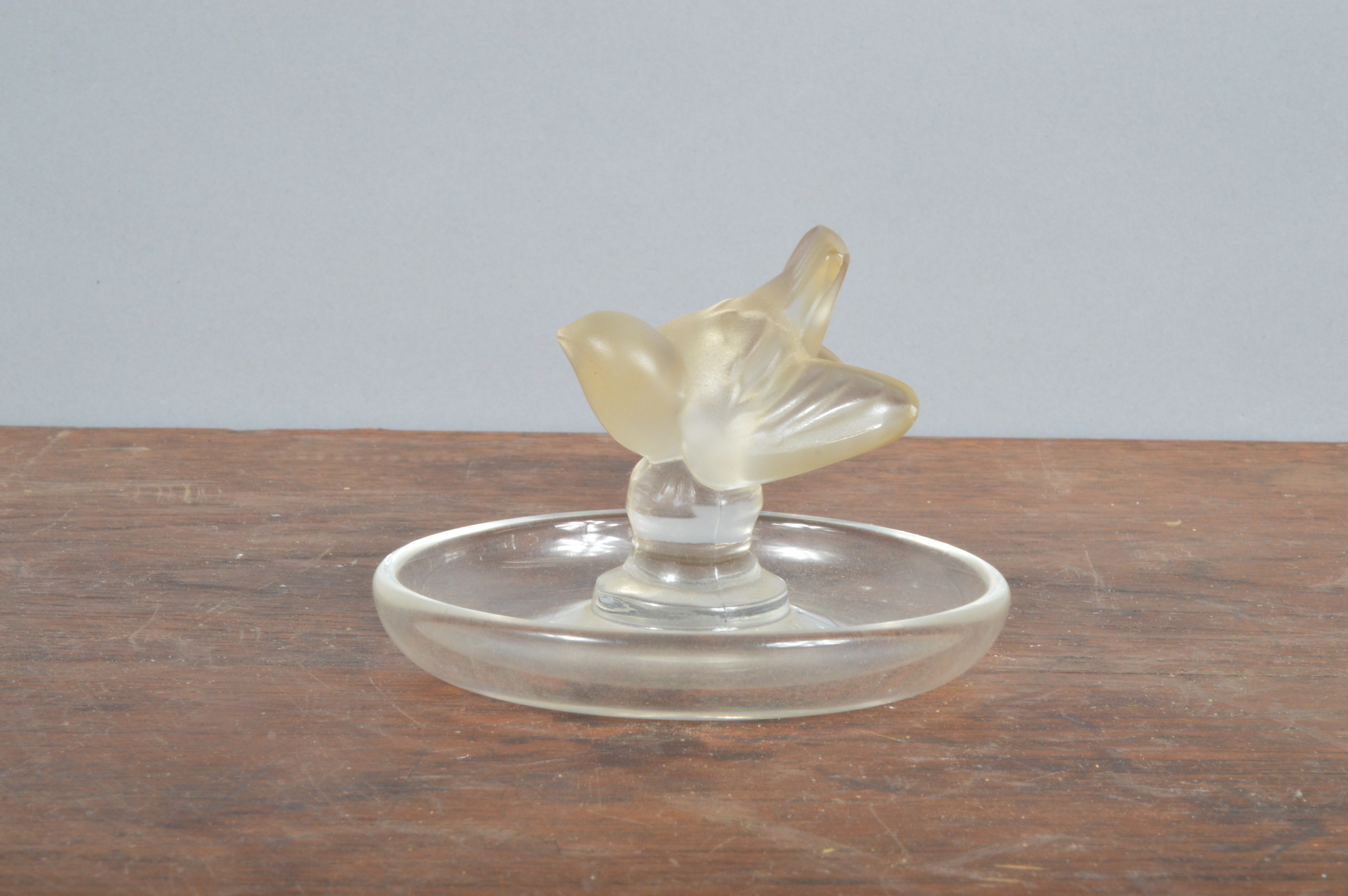 A 20th century Lalique France ashtray, marked to the underside modelled as a bird with - Image 2 of 3