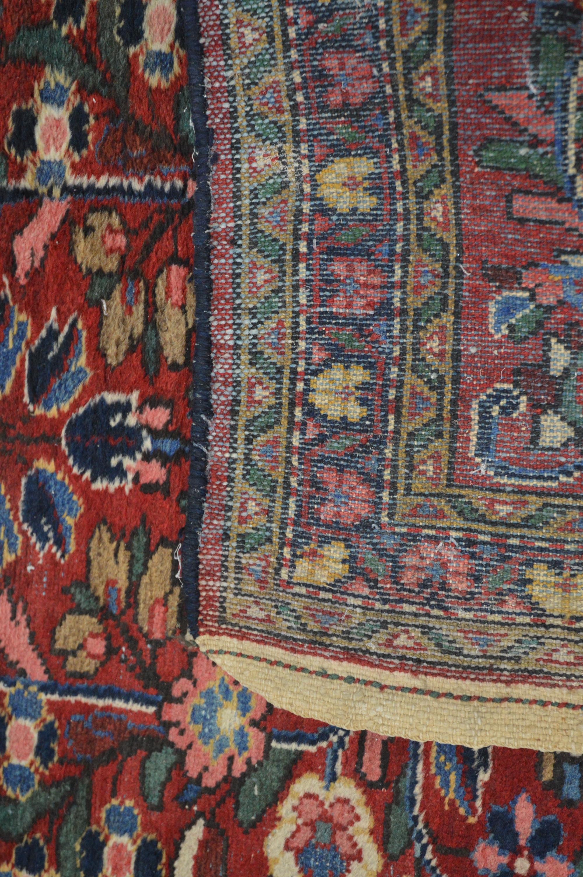 A modern Iranian wool runner, floral geometric pattern, with some wear 200cm x 87cm - Image 2 of 3