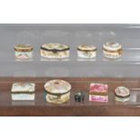 A group of 19th and 20th century Continental ceramic patch boxes, all with metal mounts, some