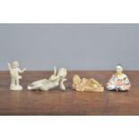 A Naples Capodimonte figure of a buddha, together with two bisque continental figures and a