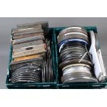 Two Trays of 9.5mm Cine Films, all mainly on 9.5 inch reels, in metal canisters, cardboard cartons &