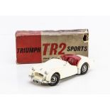 A Victory Models 1:18 Battery Operated Triumph TR2 Sports Car, ivory body, red seats and tonneau