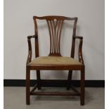 A George III mahogany armchair, probably a carver from a dinning set, serpentine shaped top rail,