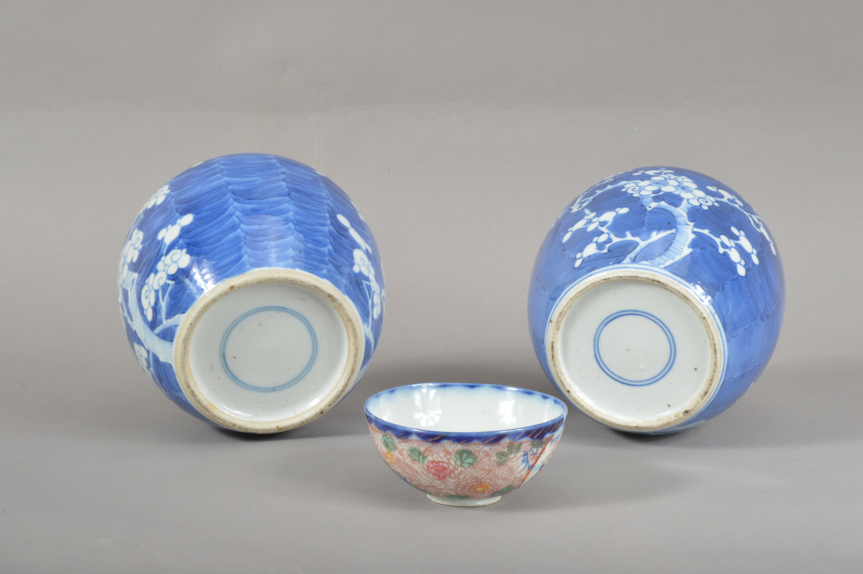 A pair of Chinese ginger jars, prunus blue and white decoration, both lids missing, both approx. - Image 2 of 2
