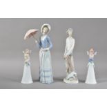 Four Lladro porcelain figurines, comprising a lady with a parasol, 32cm high, 'Quixote' standing